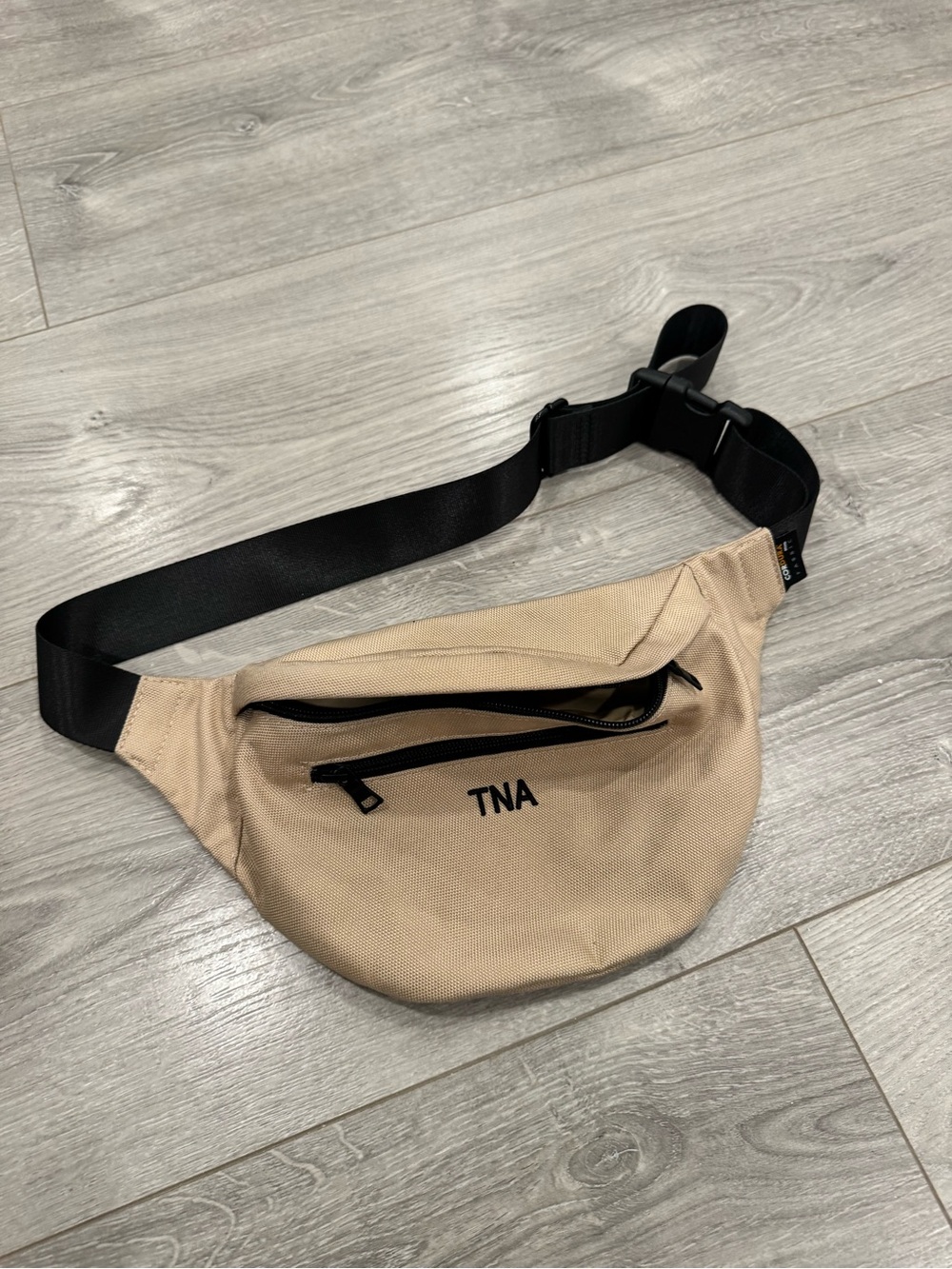 Aritzia TNA Beige Waist Bag with Black Strap